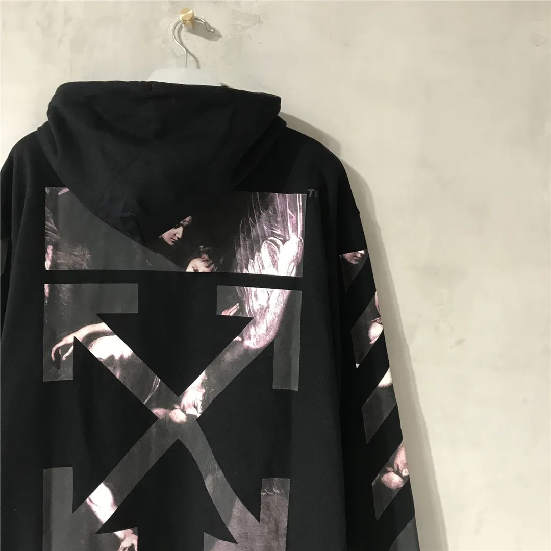 Top tested version OFF WHITE OW Certified Angel Wings Madonna Religious Oil Painting Men's and Women's Round Neck Zipper Cardigan Sweater The A mark on the neckline is a 3M reflective mark, customized model, not an embroidery mark, first look for identification.  The Renaissance-themed Caravaggio Madonna oil painting is inspired by one of Caravaggio's famous oil paintings, with a strong religious color! World treasures, top-notch paintings, and walking art pieces follow the original craftsmanship and use 5-color glue to create an effect. It is not offset printing, but many people on the market use Kornit direct inkjet instead. Whether it is the top version, touch the printing with your hand. The correct process is that it has a frosted feel. This is also a way to identify the uniqueness of the product. The fabric is 100% combed cotton terry fabric, 480 grams, ensuring the originality of the craftsmanship! Secondly, the tag rope of this model hangs from the collar tag, not the side rope. Customized auxiliary materials, complete accessories, consistent zp, hang tags, collar labels, and washed labels, feel free to compare!   Color: Black White Size Chart